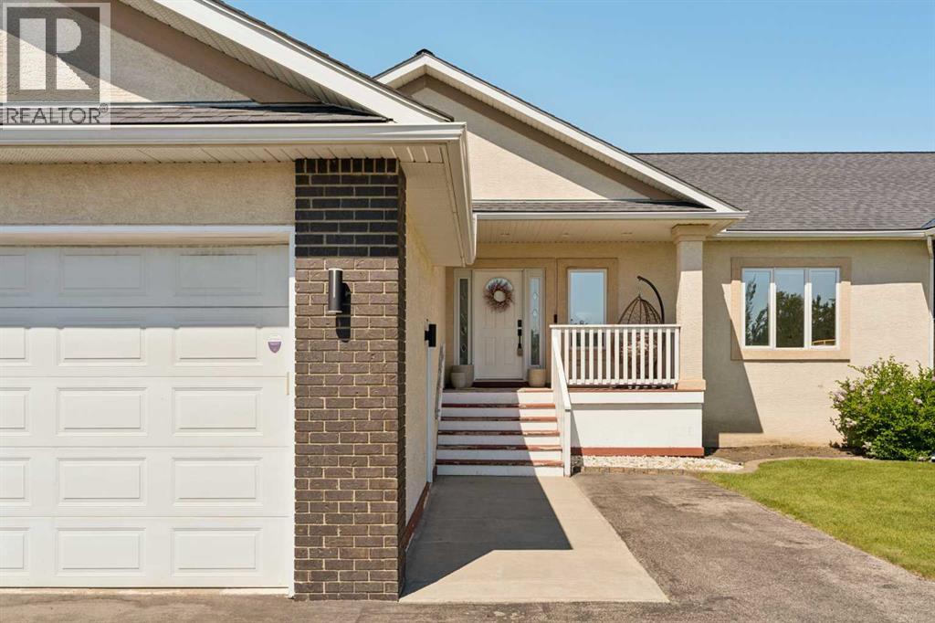 52 Silvertip Drive, Rural Foothills County, Alberta  T1V 1Z2 - Photo 2 - A2324117