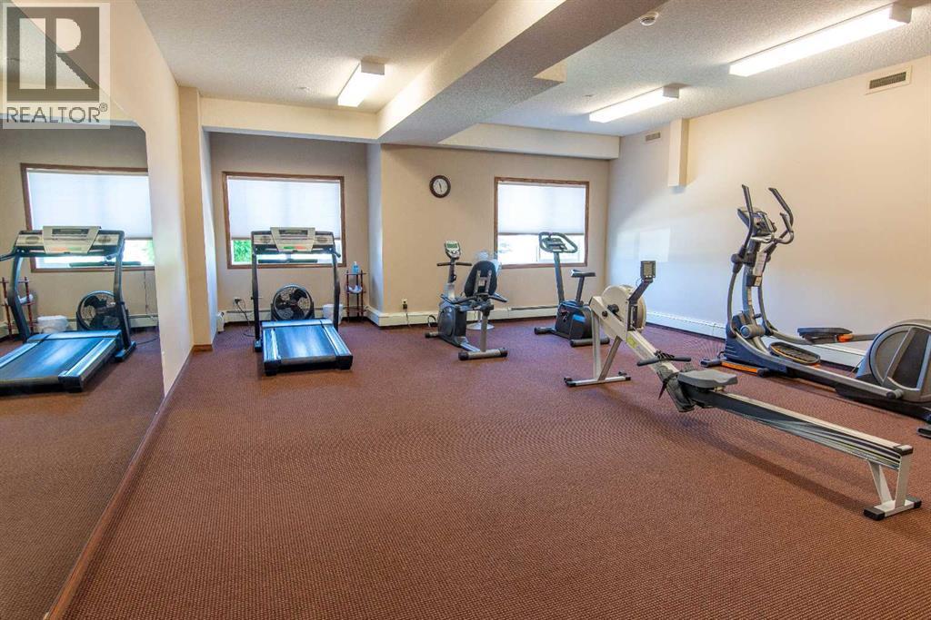 112, 72 Quigley Drive, Cochrane, Alberta  T4C 2K6 - Photo 23 - A2324594
