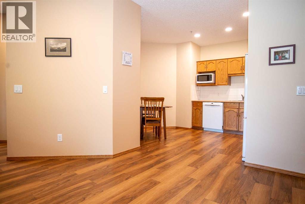 112, 72 Quigley Drive, Cochrane, Alberta  T4C 2K6 - Photo 6 - A2324594