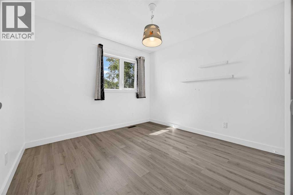 7 Signature Mews Sw, Calgary, Alberta  T3H 2V6 - Photo 28 - A2323821