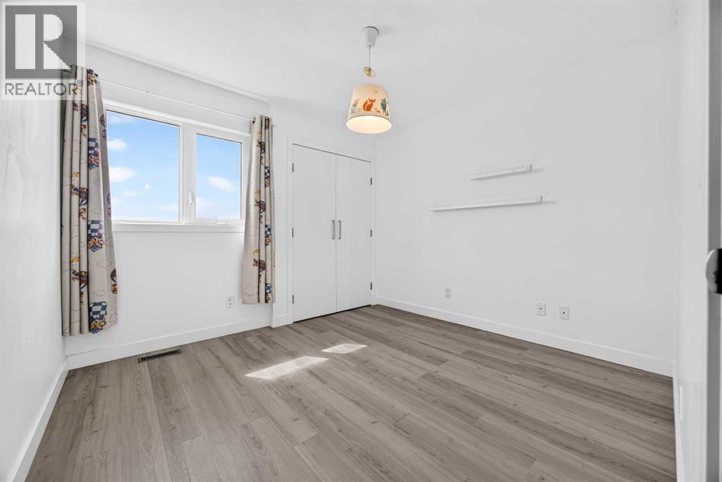 7 Signature Mews Sw, Calgary, Alberta  T3H 2V6 - Photo 25 - A2323821