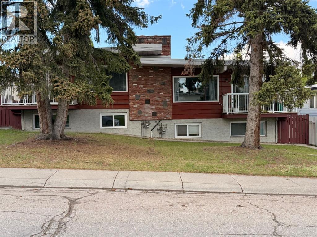 11131 Sacramento Drive SW, Calgary, Alberta  T2W 0J5 - Photo 2 - A2324329