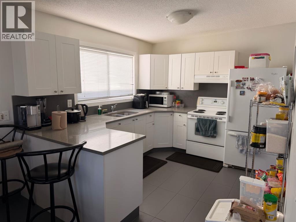 11129 & 11131 Sacramento Drive SW, Calgary, Alberta  T2W 0J5 - Photo 4 - A2324329