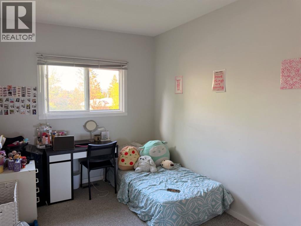 11129 & 11131 Sacramento Drive SW, Calgary, Alberta  T2W 0J5 - Photo 21 - A2324329