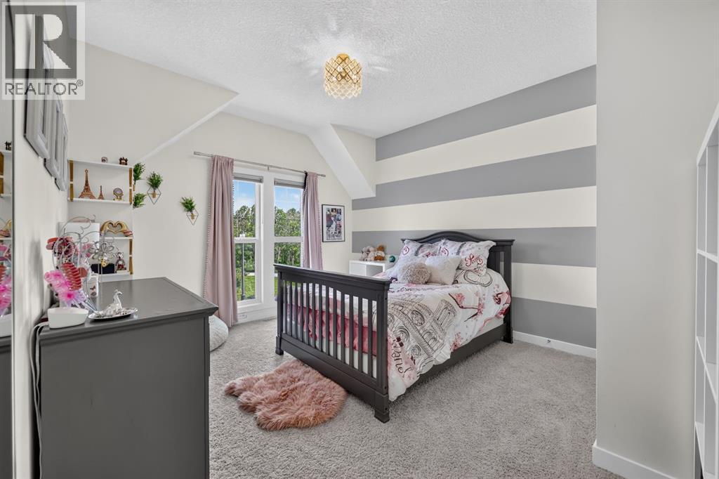 60 Tremblant Terrace SW, Calgary, Alberta  T3H 0B9 - Photo 26 - A2324421