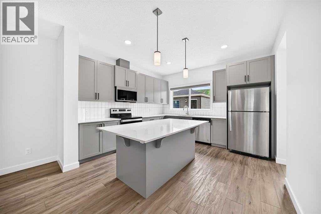 339 Wolf Creek Way SE, Calgary, Alberta  T2X 4Y8 - Photo 3 - A2324786