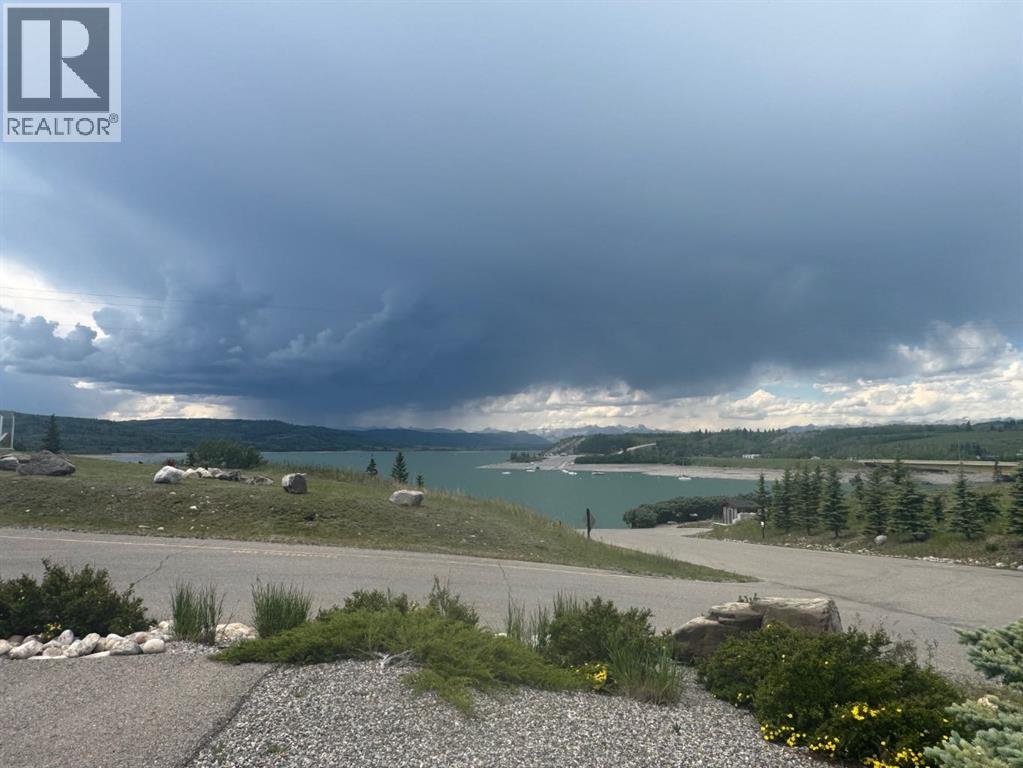 301 Cottageclub Green, Rural Rocky View County, Alberta  T4C 1B1 - Photo 46 - A2320466