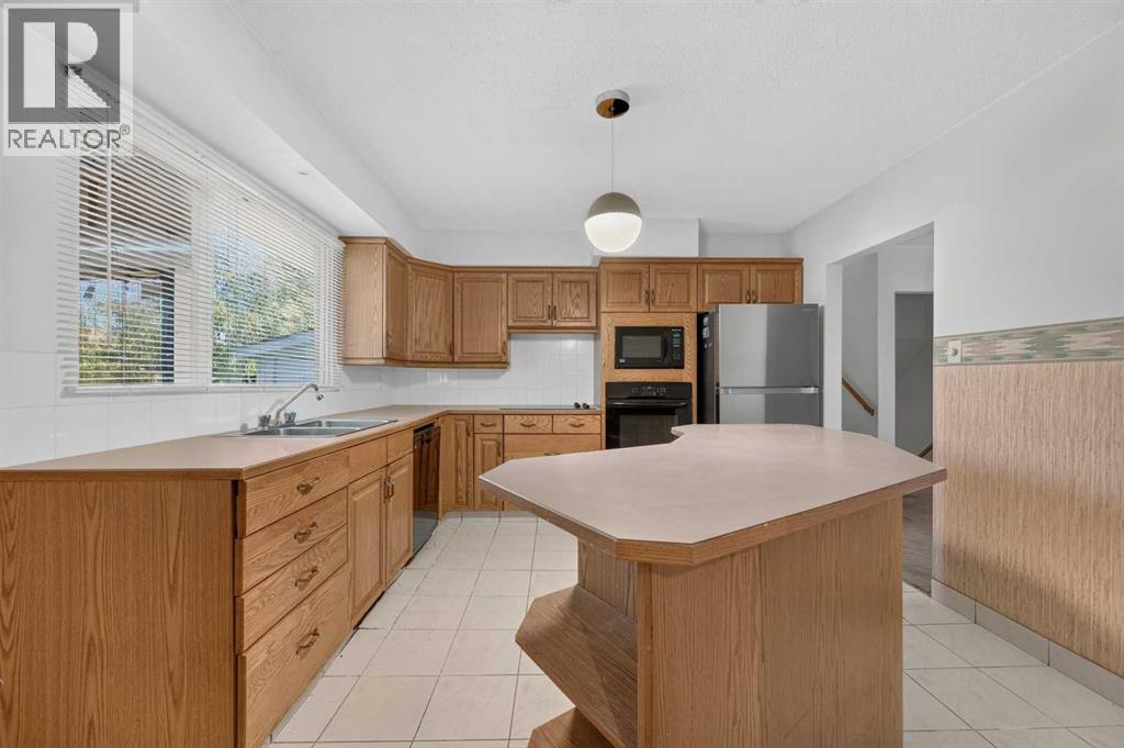 117 Fairview Drive Se, Calgary, Alberta  T2H 1B4 - Photo 10 - A2323822