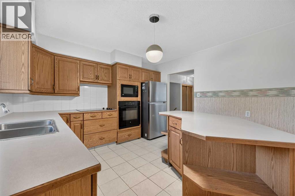 117 Fairview Drive Se, Calgary, Alberta  T2H 1B4 - Photo 11 - A2323822