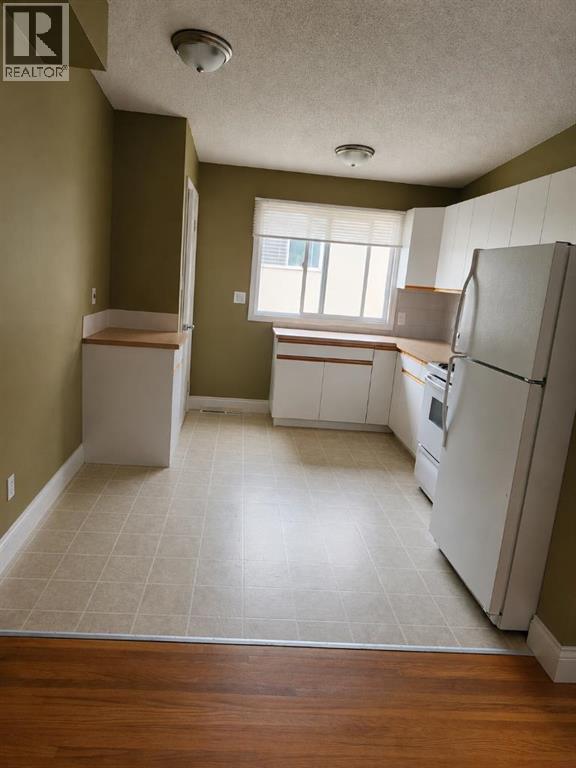 1001 Mckinnon Drive NE, Calgary, Alberta  T2E 6A7 - Photo 7 - A2324087