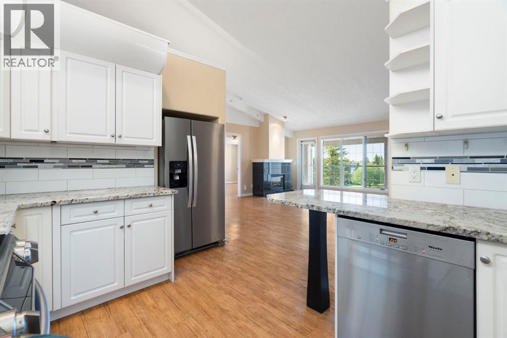 310, 6868 Sierra Morena Boulevard Sw, Calgary, Alberta  T3H 3R6 - Photo 12 - A2324275