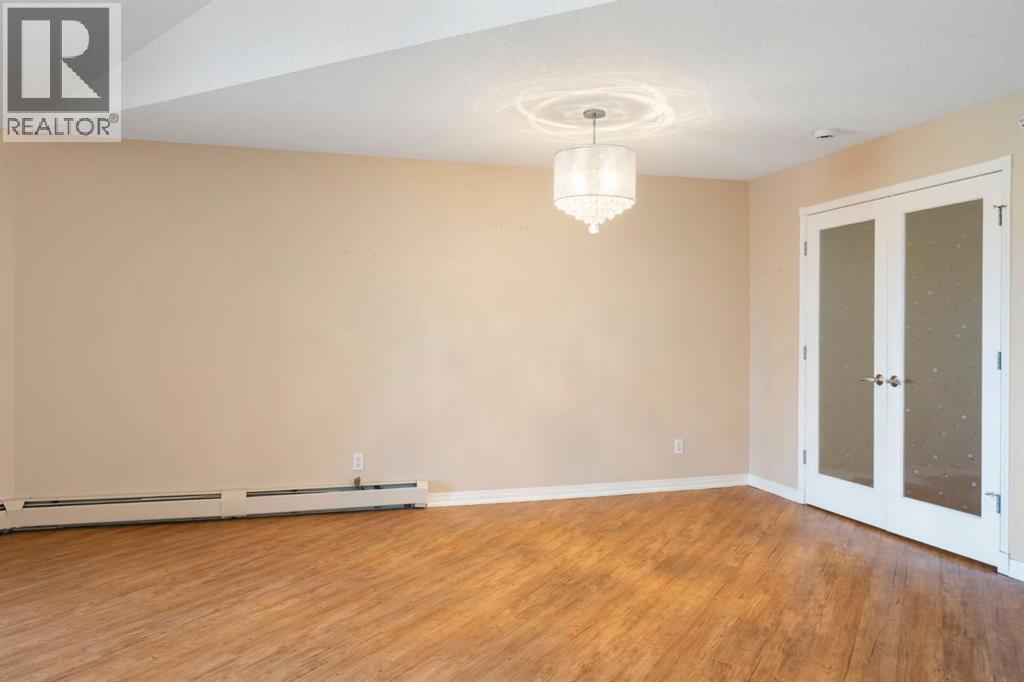 310, 6868 Sierra Morena Boulevard Sw, Calgary, Alberta  T3H 3R6 - Photo 13 - A2324275