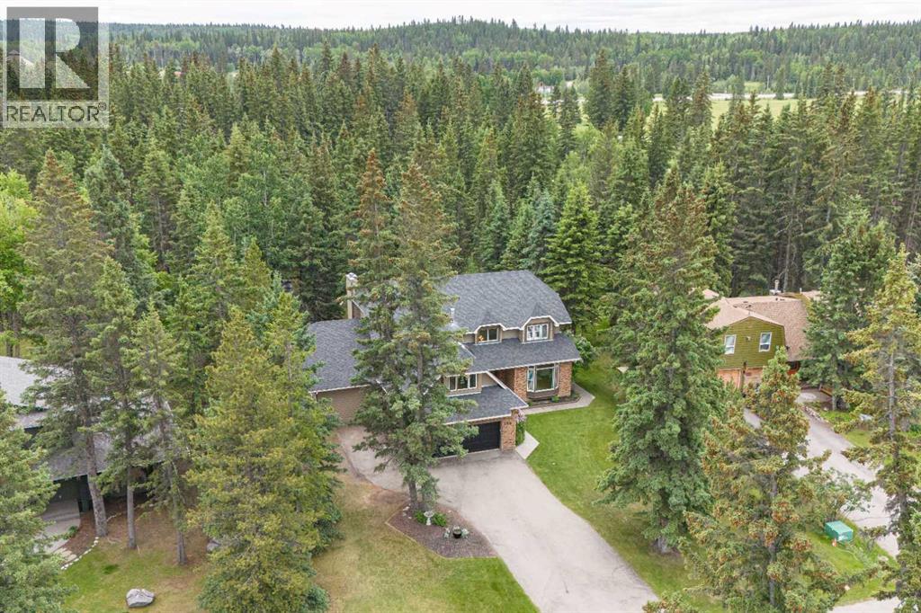 108 Redwood Meadows Drive, Rural Rocky View County, Alberta  T3Z 1A3 - Photo 3 - A2323025