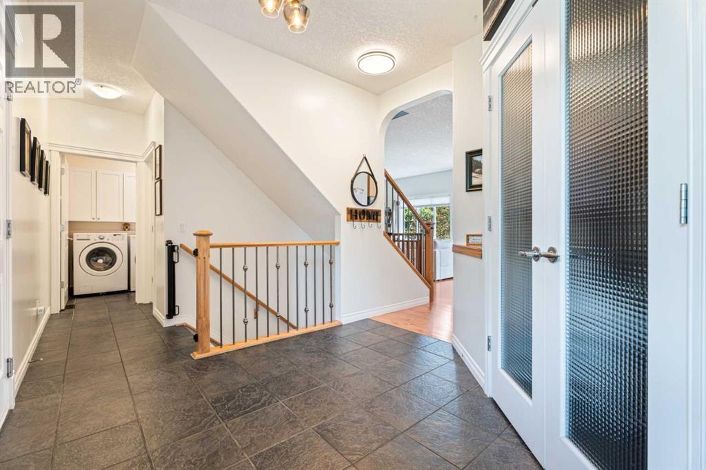 7 Crystal Green Way, Okotoks, Alberta  T1S 2K5 - Photo 2 - A2324560