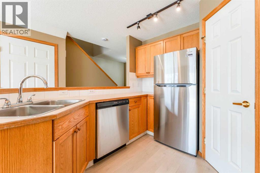59 Erin Grove SE, Calgary, Alberta  T2B 3L1 - Photo 7 - A2323252