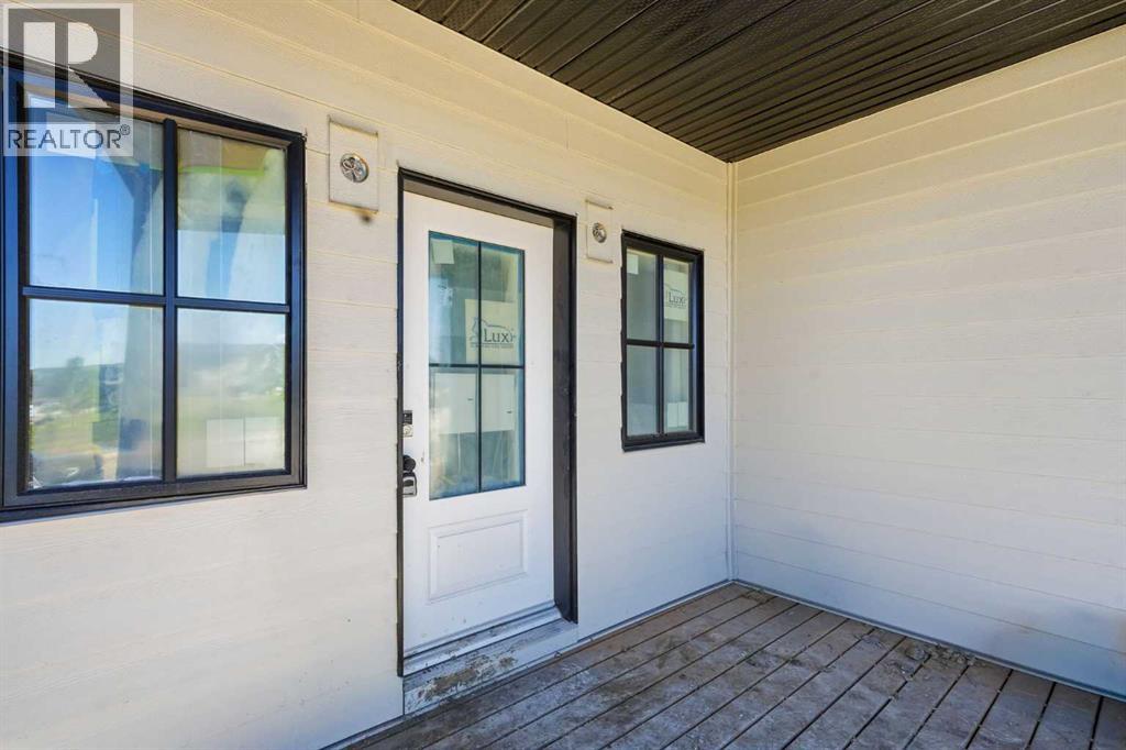 329 Flare Avenue Sw, Diamond Valley, Alberta  T0L 2A0 - Photo 4 - A2322046