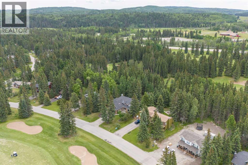 108 Redwood Meadows Drive, Rural Rocky View County, Alberta  T3Z 1A3 - Photo 4 - A2323025