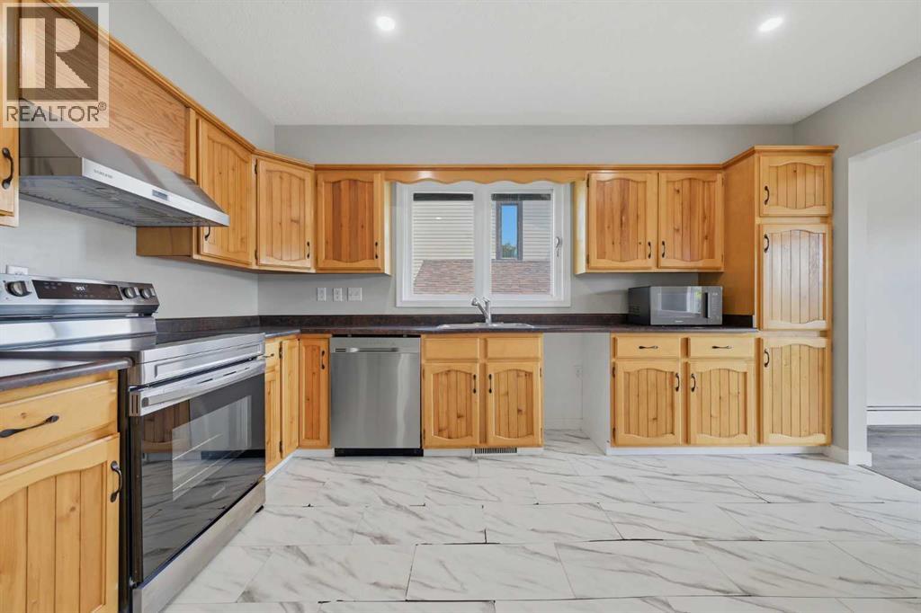 425 Big Springs Drive SE, Airdrie, Alberta  T4A 1A6 - Photo 7 - A2323107