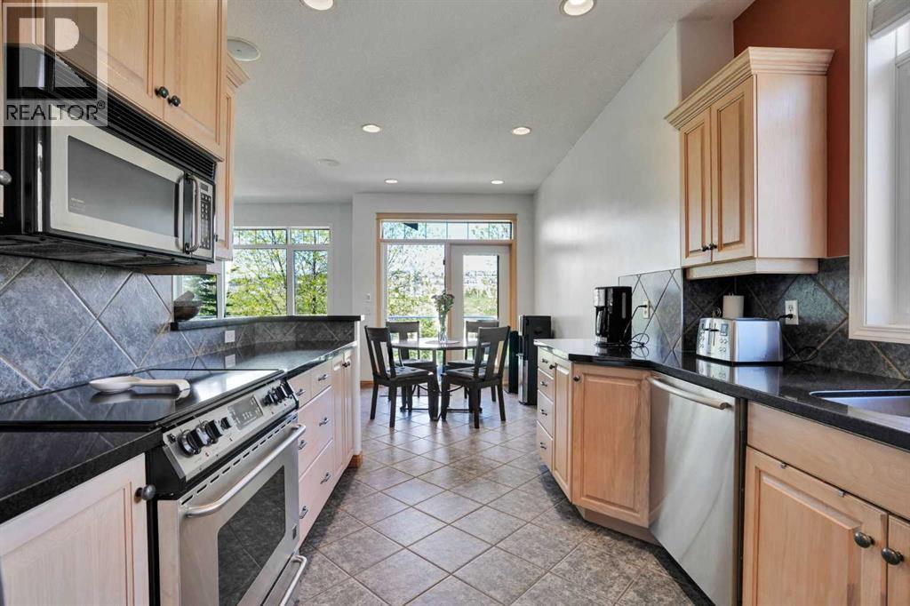 6 Discovery Woods Villas SW, Calgary, Alberta  T3H 5A6 - Photo 33 - A2323139