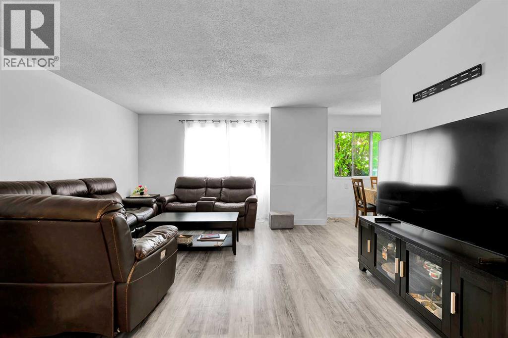 101, 516 Blackthorn Road NE, Calgary, Alberta  T2K 4W9 - Photo 3 - A2324983