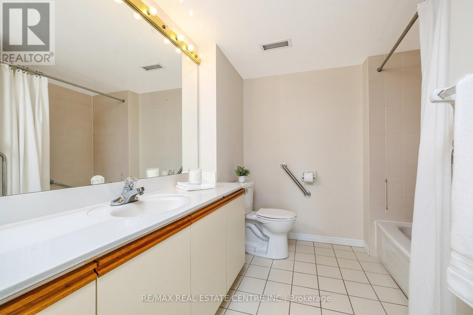 1202 - 100 Millside Drive, Milton, Ontario  L9T 5E2 - Photo 21 - W13500596