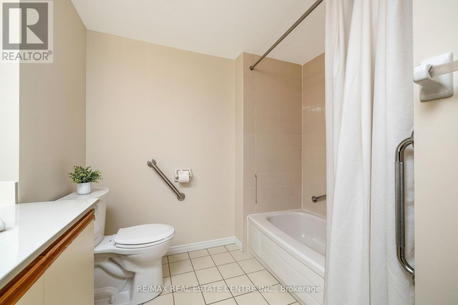 1202 - 100 Millside Drive, Milton, Ontario  L9T 5E2 - Photo 22 - W13500596