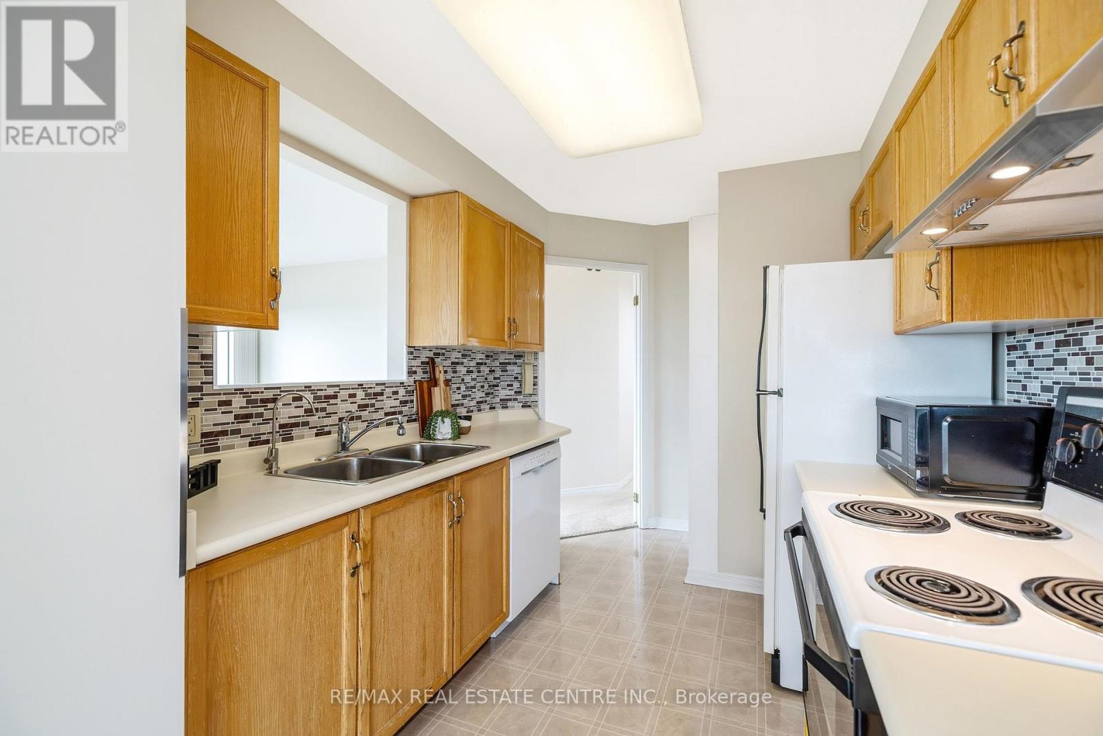 1202 - 100 Millside Drive, Milton, Ontario  L9T 5E2 - Photo 25 - W13500596