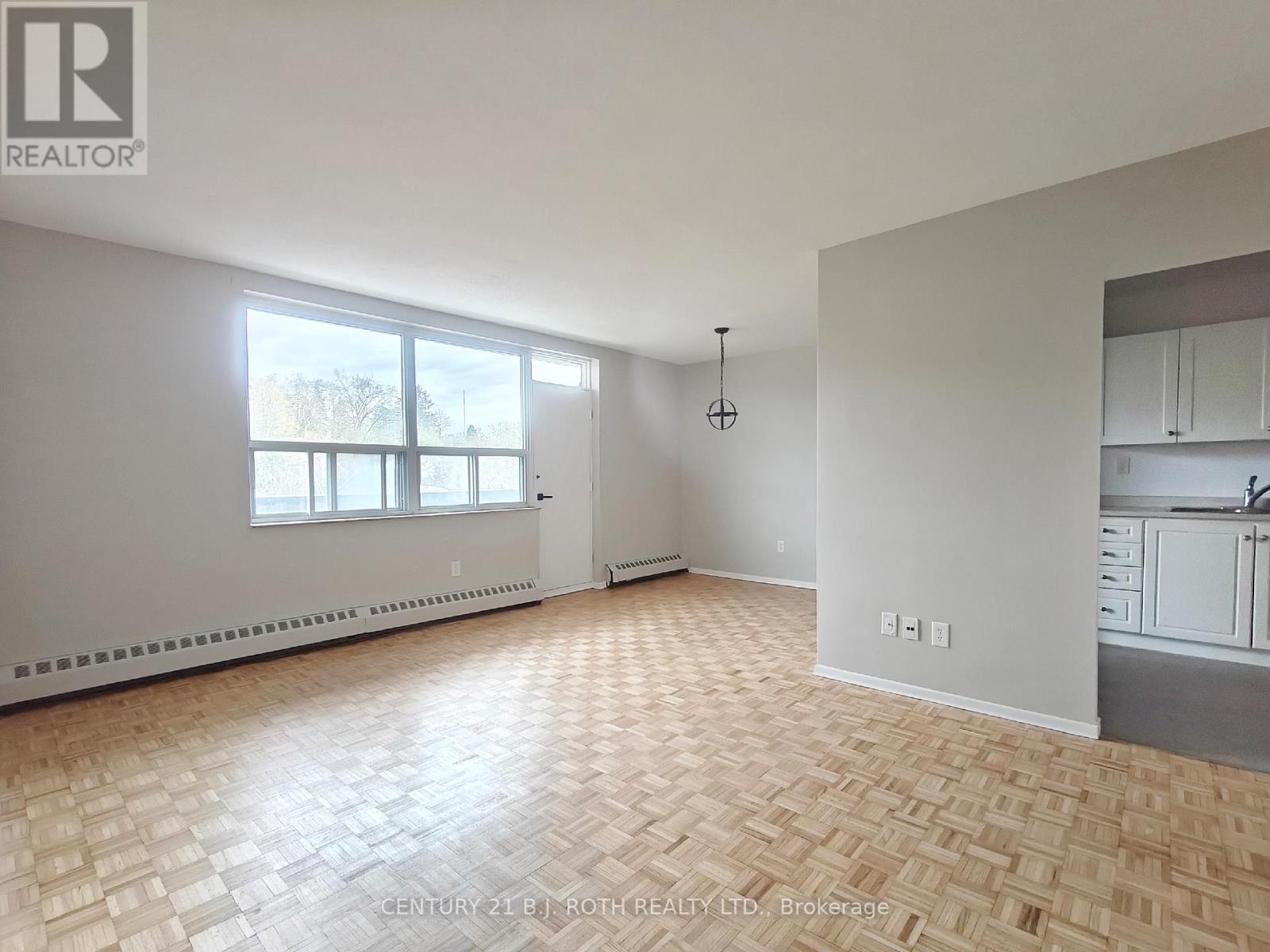 406 - 90 Holgate Street, Barrie, Ontario  L4N 2T9 - Photo 2 - S13501010