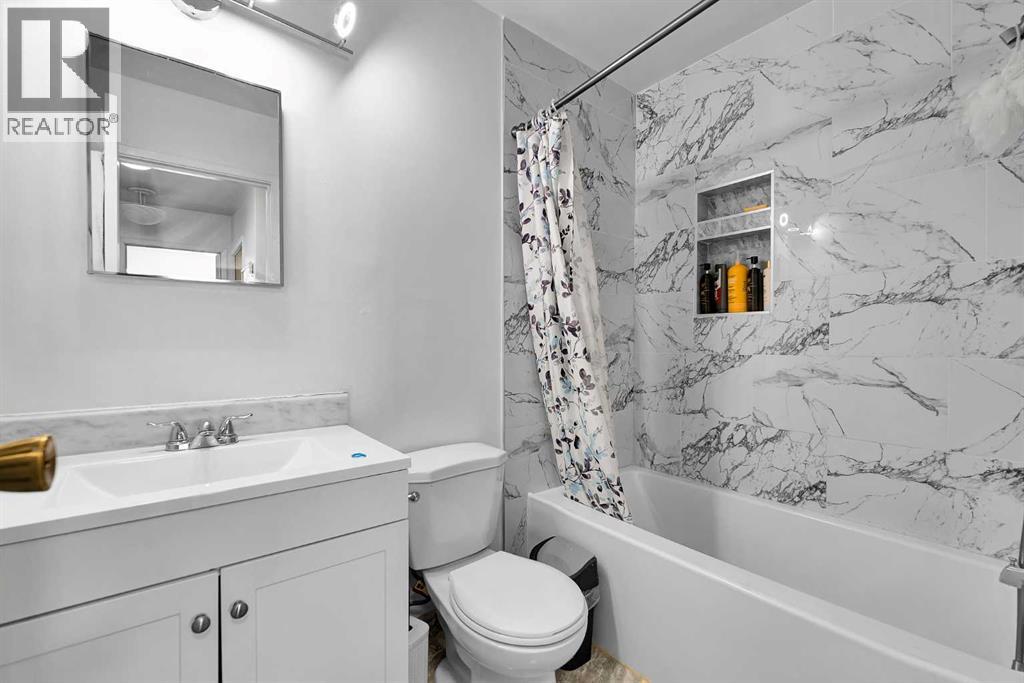 101, 516 Blackthorn Road NE, Calgary, Alberta  T2K 4W9 - Photo 21 - A2324983