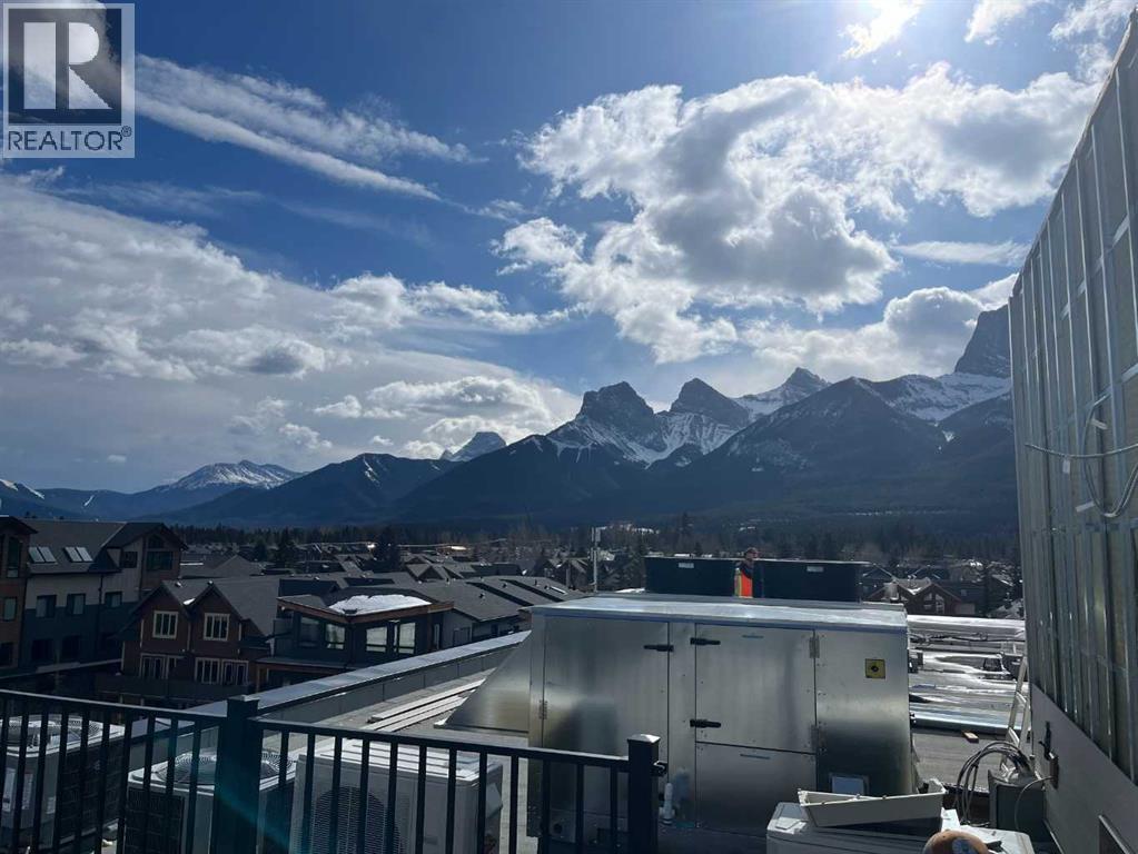 201, 825 8th Street, Canmore, Alberta  T1W 2B7 - Photo 1 - A2296976