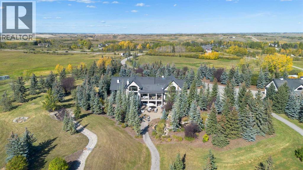 32045 Willow Way, Rural Rocky View County, Alberta  T4C 2Y4 - Photo 1 - A2304339