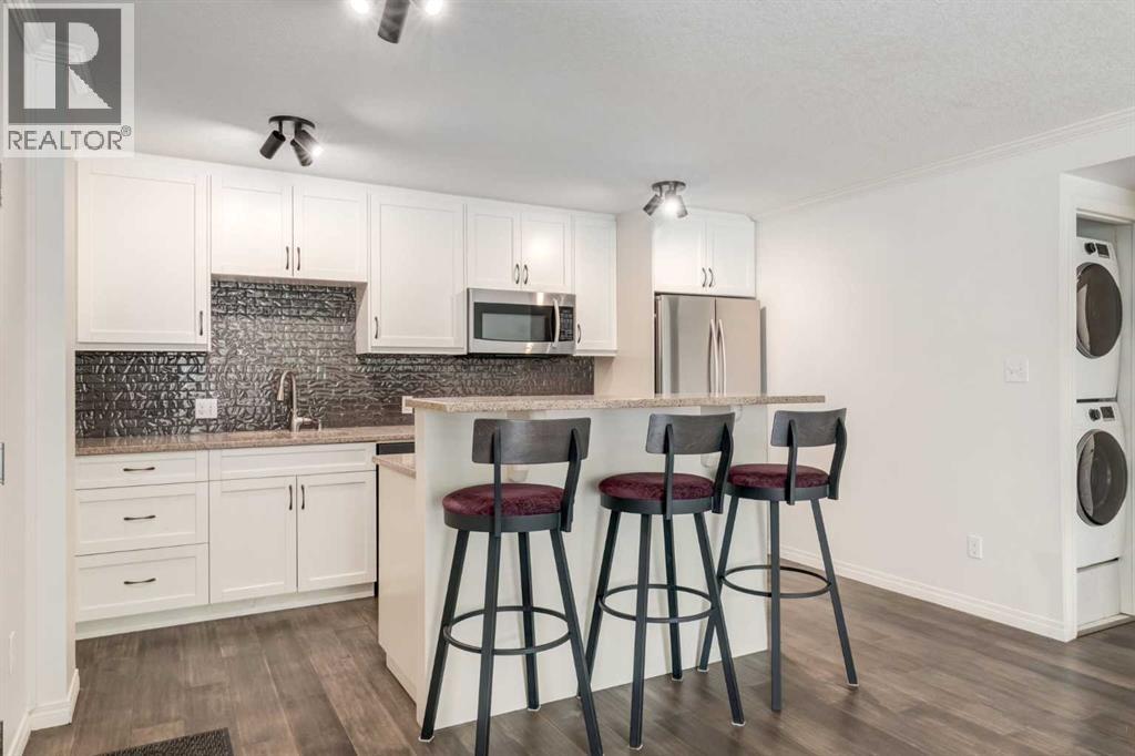 102, 126 24 Avenue SW, Calgary, Alberta  T2S 0J9 - Photo 1 - A2320098