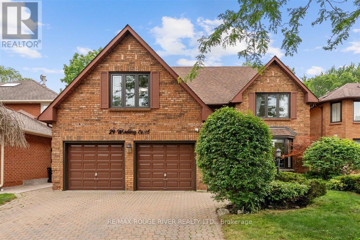 <div class="slider-price">$1,499,000</div><p>29 Winding Court, Toronto, Ontario</p>