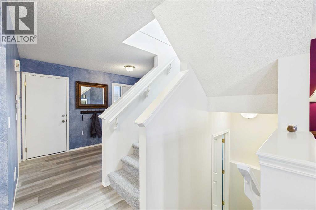 225 Bridlewood Court SW, Calgary, Alberta  T2Y 3Z2 - Photo 6 - A2323883