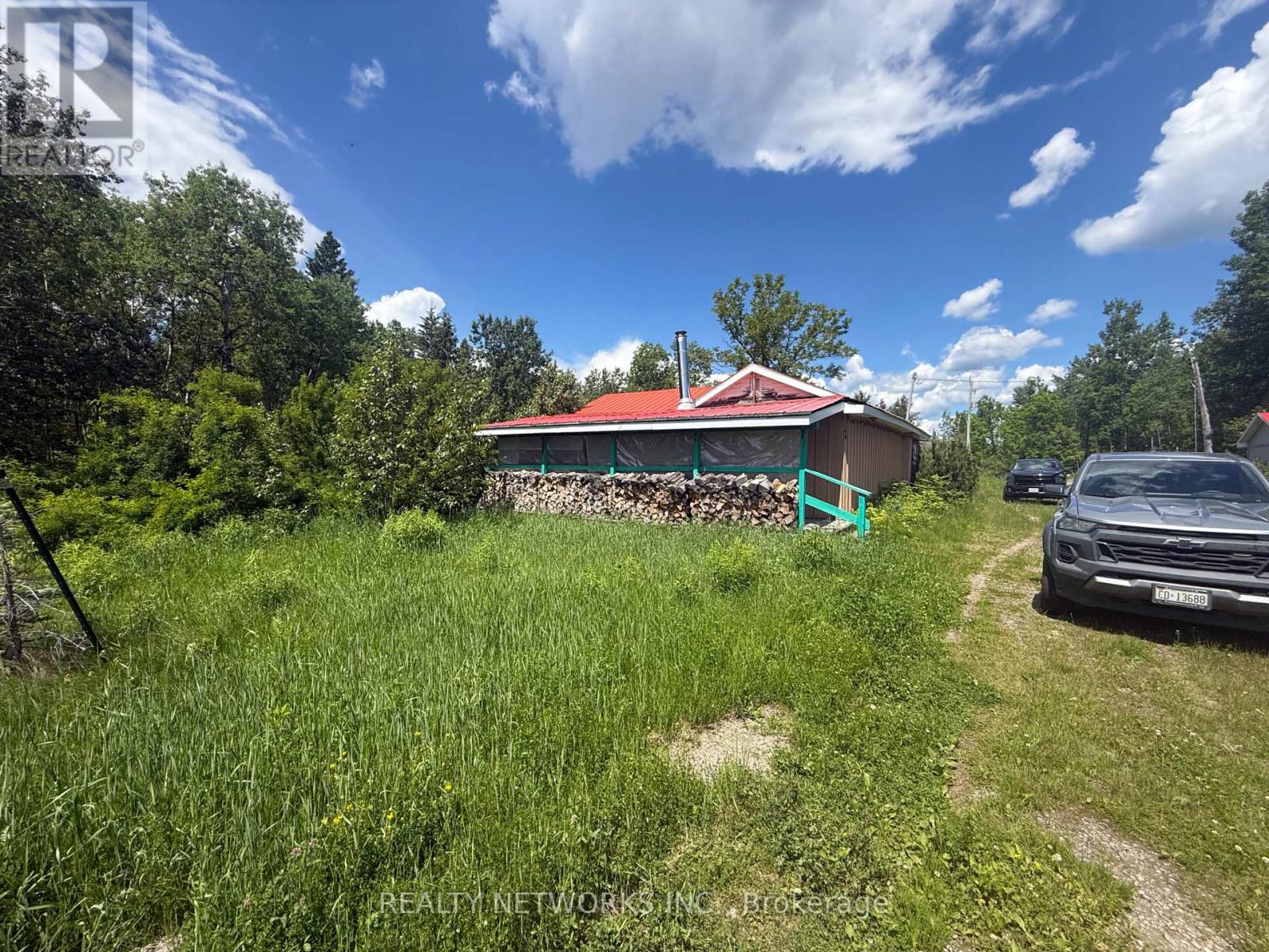 1039 Camp Bickell Road, Iroquois Falls, Ontario  P0N 1A0 - Photo 1 - T13504986