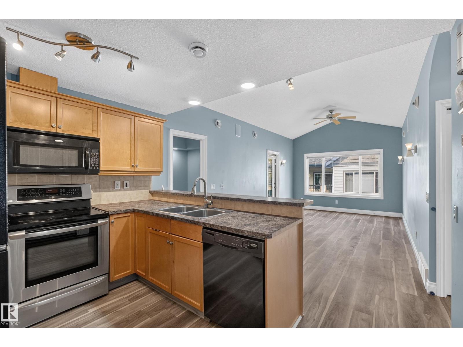 #18 2565 Hanna Cr Nw, Edmonton, Alberta  T6R 0M4 - Photo 2 - E4496411