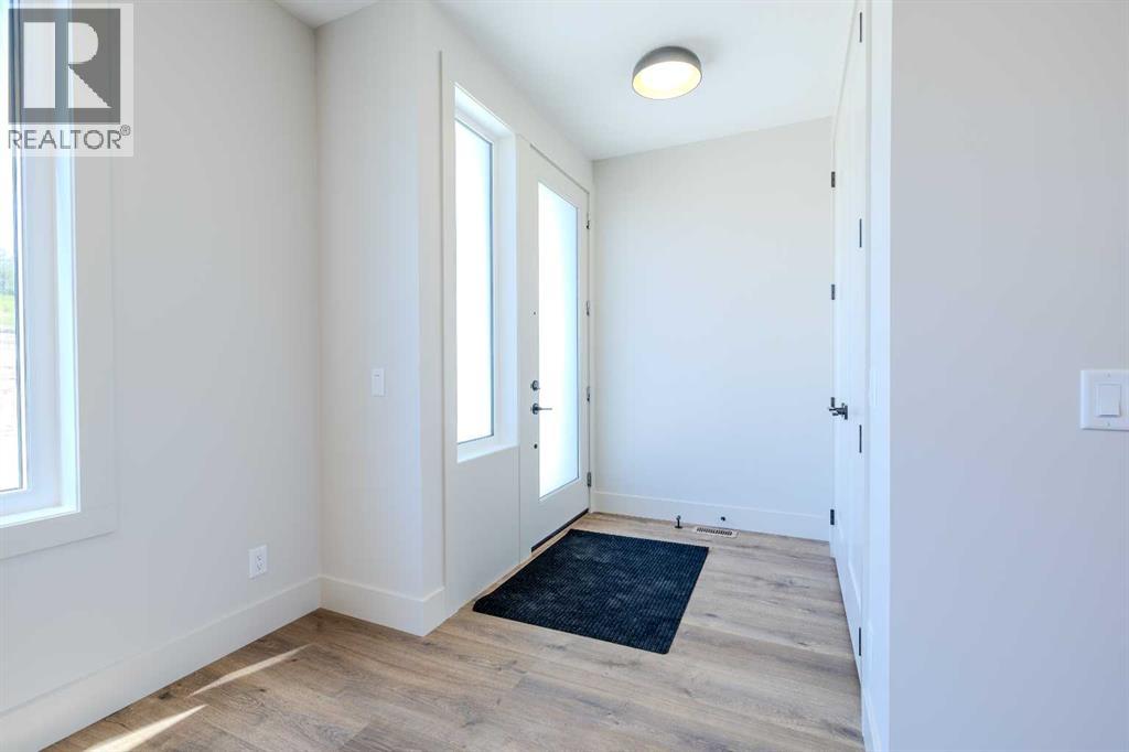 12 Tillotson Downs, Okotoks, Alberta  T1S 4Z5 - Photo 2 - A2292428