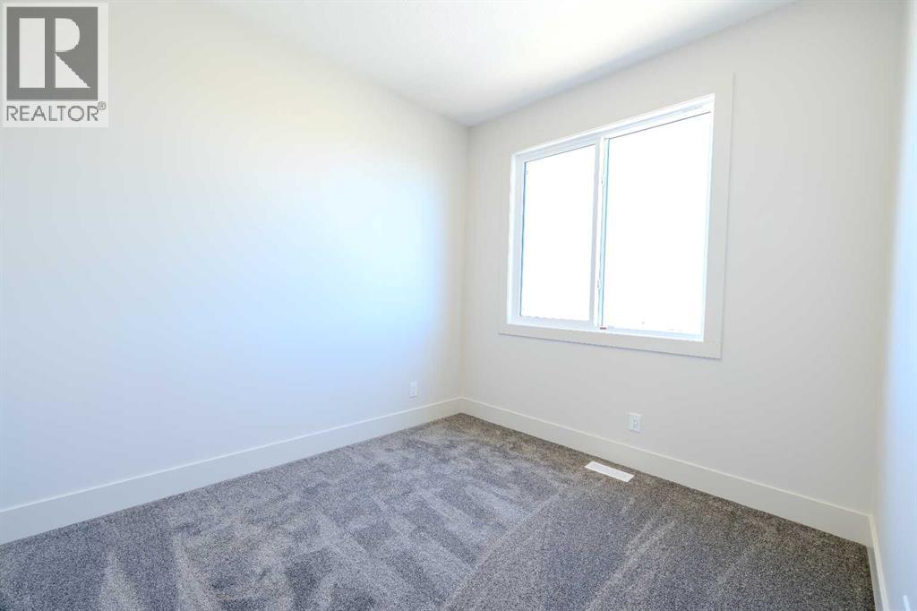 12 Tillotson Downs, Okotoks, Alberta  T1S 4Z5 - Photo 25 - A2292428