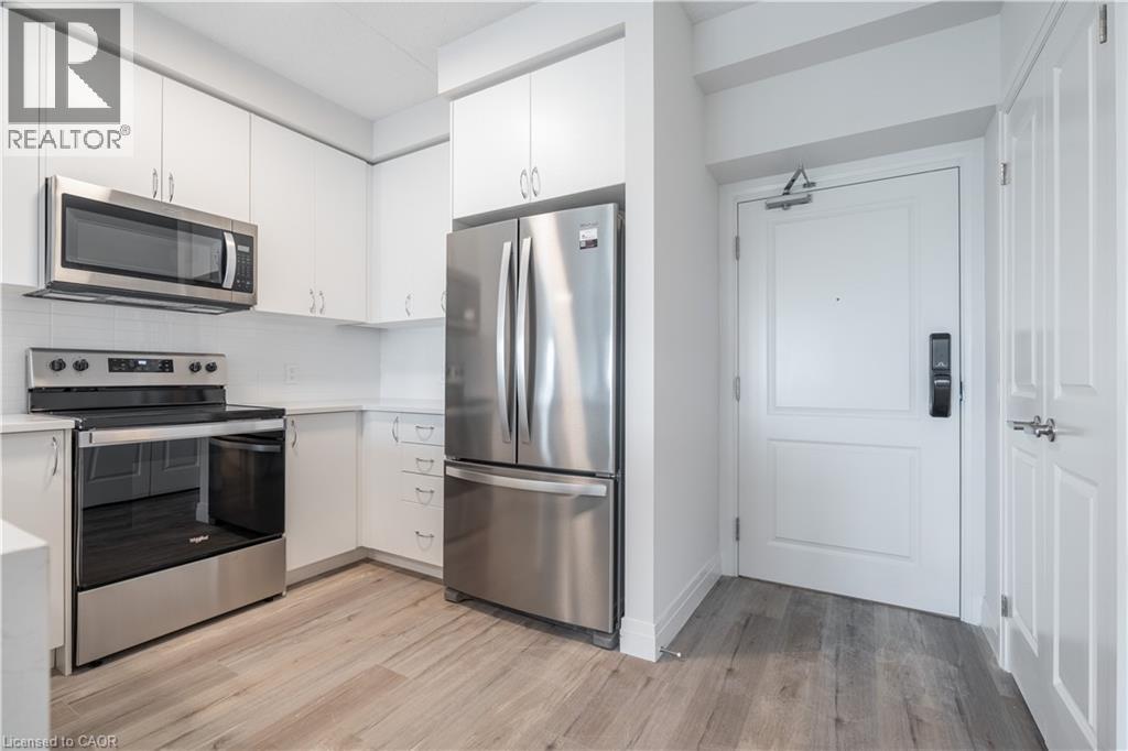 6415 Regional Road 25 Unit# 307, Milton, Ontario  L9T 9M9 - Photo 2 - 40844377