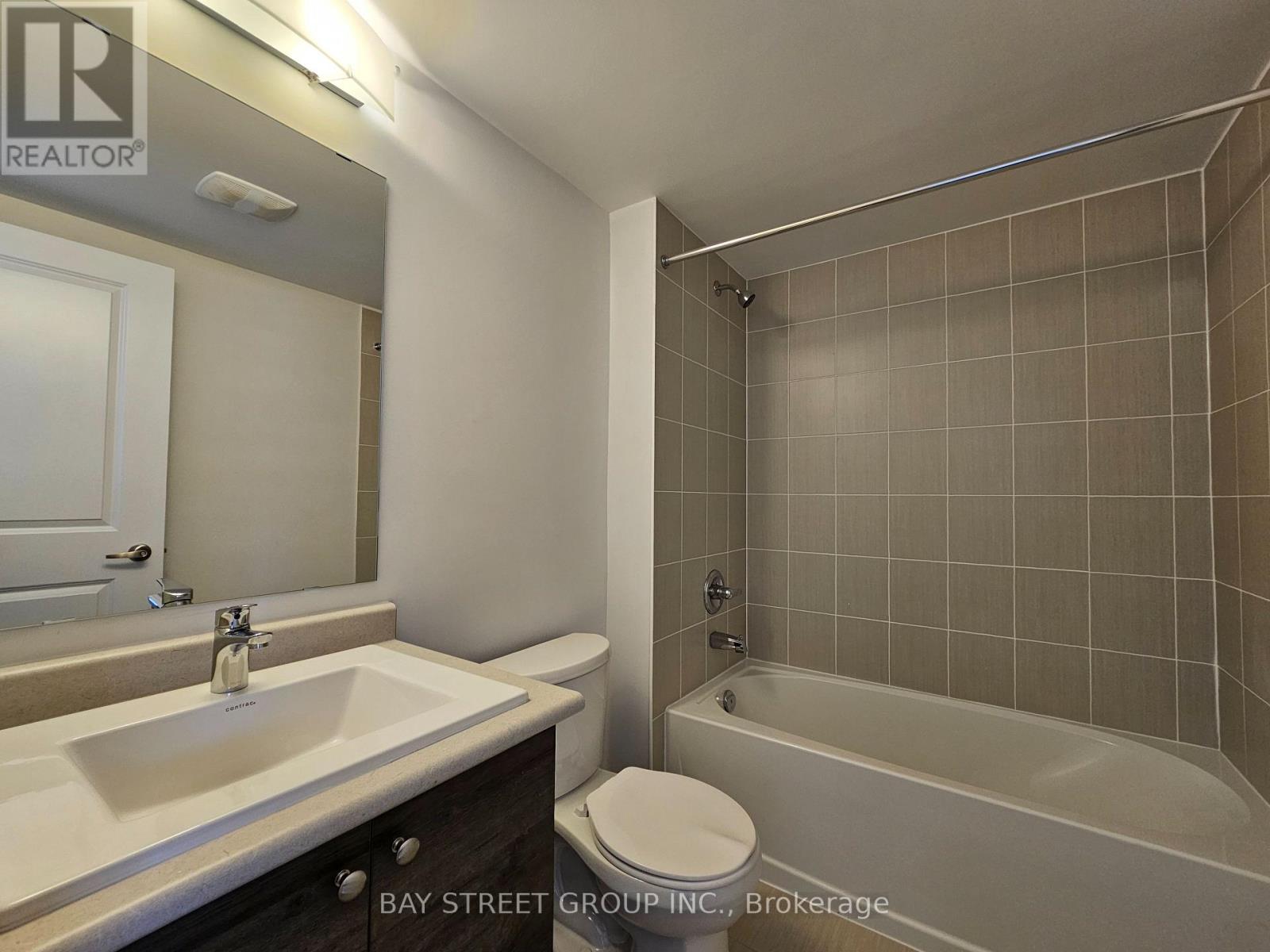 52 Aki Thomas Gardens, Toronto, Ontario  M1P 0G3 - Photo 4 - E13507812