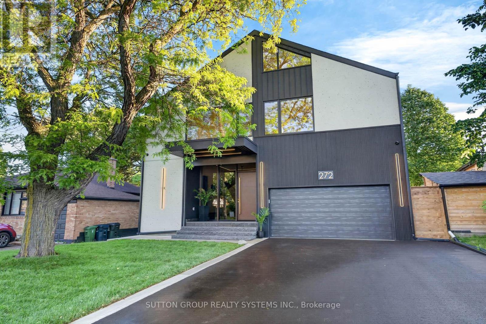 Welcome to a custom-built house offering approximately 5,600 sq. ft. of finished living space, thoughtfully crafted with luxurious finishes, state-of-the-art technology, and unparalleled attention to detail. Nested on a premium ravine lot, this extraordinary home seamlessly blends sophisticated design with everyday functionality. It boasts 4 spacious bedrooms plus an additional bedroom in the lower level. This home features 5 full bathrooms and 2 powder rooms, providing comfort and convenience for both family living and entertaining. The interior showcases hardwood flooring throughout the main living areas, and the lower level and attic are finished with waterproof laminate flooring. The basement is enhanced by hydronic in-floor heating throughout, creating a warm and inviting retreat year-round. A spectacular custom gourmet kitchen, with premium Bosch appliances, an oversized centre island, integrated refrigerator plus dishwasher, and a 6-burner gas cooktop, creates an ideal setting for both everyday meals and entertaining. Elegant gathering spaces are highlighted by a striking gas fireplace framed in natural stone, while a sophisticated wet bar, complete with a wine cooler, is also featured. The exterior is beautifully enhanced with custom gemstone detailing at both the front and rear of the home, adding timeless curb appeal. Designed to embrace its picturesque surroundings, the property offers walkouts to private balconies on every level. Gas BBQ lines are conveniently installed on every patio. Practical luxury continues with a mudroom offering direct access from the garage, abundant built-in storage, and an adjacent dog-wash room-perfect for active families and pet owners alike. The fully insulated and finished double garage, 12 feet high, includes rough-ins for both gas and electric heaters, as well as an installed electric vehicle charging station, providing future-ready convenience. The Property TAX will be reassessed. (id:48254)
