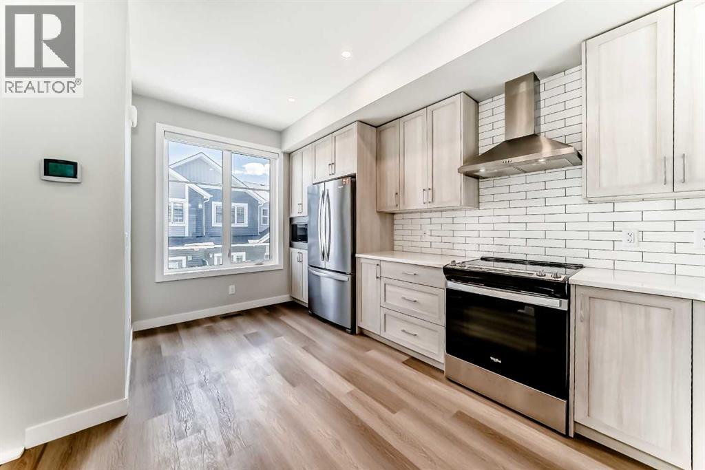 1326 Sage Hill Grove Nw, Calgary, Alberta  T3R 2A1 - Photo 7 - A2323104