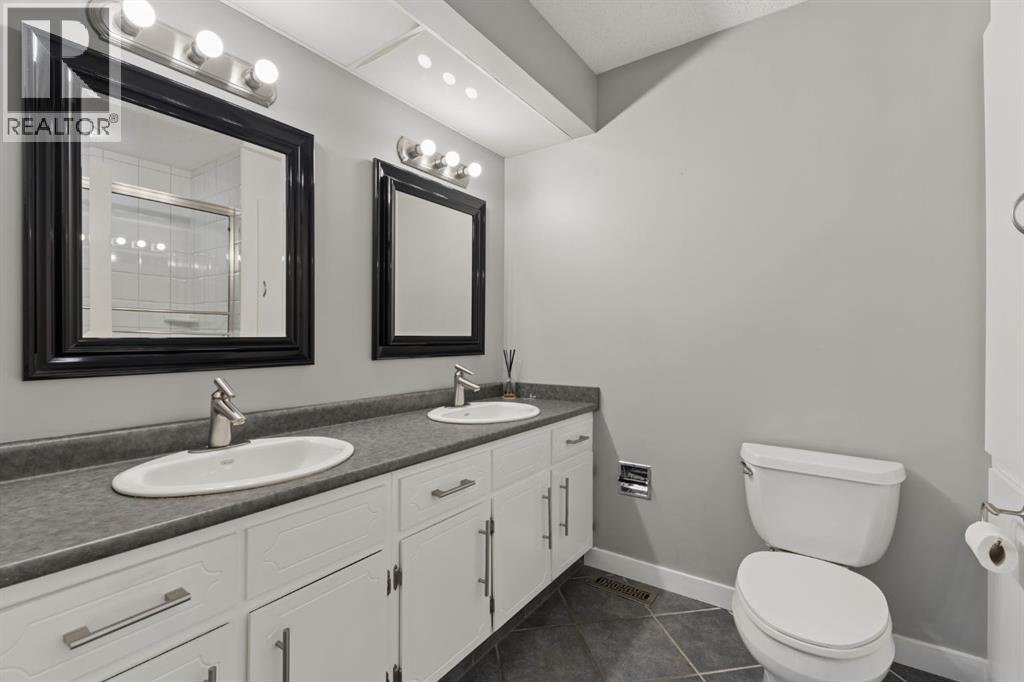 692 Woodpark Boulevard SW, Calgary, Alberta  T2E 3R7 - Photo 28 - A2325814