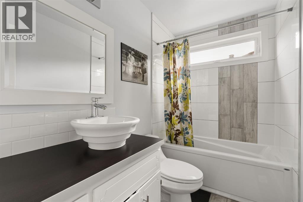 692 Woodpark Boulevard SW, Calgary, Alberta  T2E 3R7 - Photo 31 - A2325814
