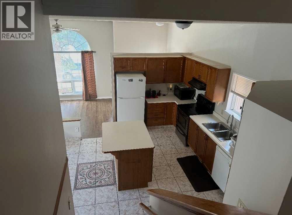 6934 Laguna Way Ne, Calgary, Alberta  T1Y 6W2 - Photo 2 - A2320961