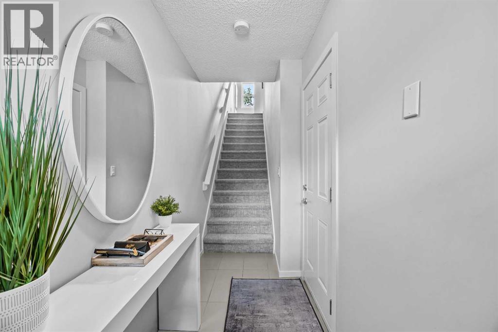328 Ascot Circle Sw, Calgary, Alberta  T3H 0X2 - Photo 6 - A2325855