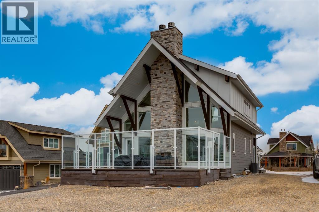 406 Cottageclub Cove, Rural Rocky View County, Alberta  T4C 1B1 - Photo 5 - A2297871