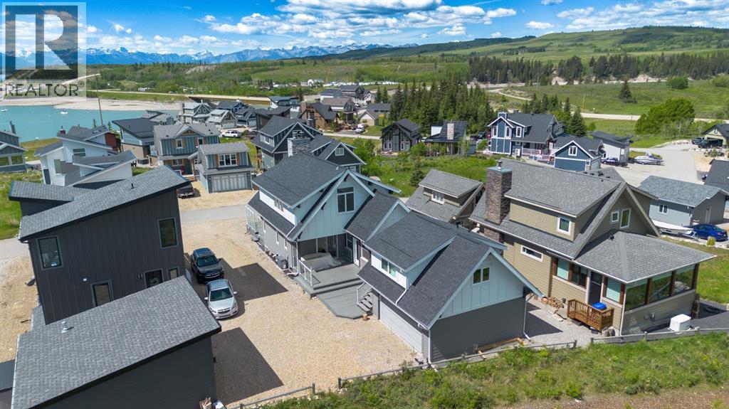 406 Cottageclub Cove, Rural Rocky View County, Alberta  T4C 1B1 - Photo 4 - A2297871