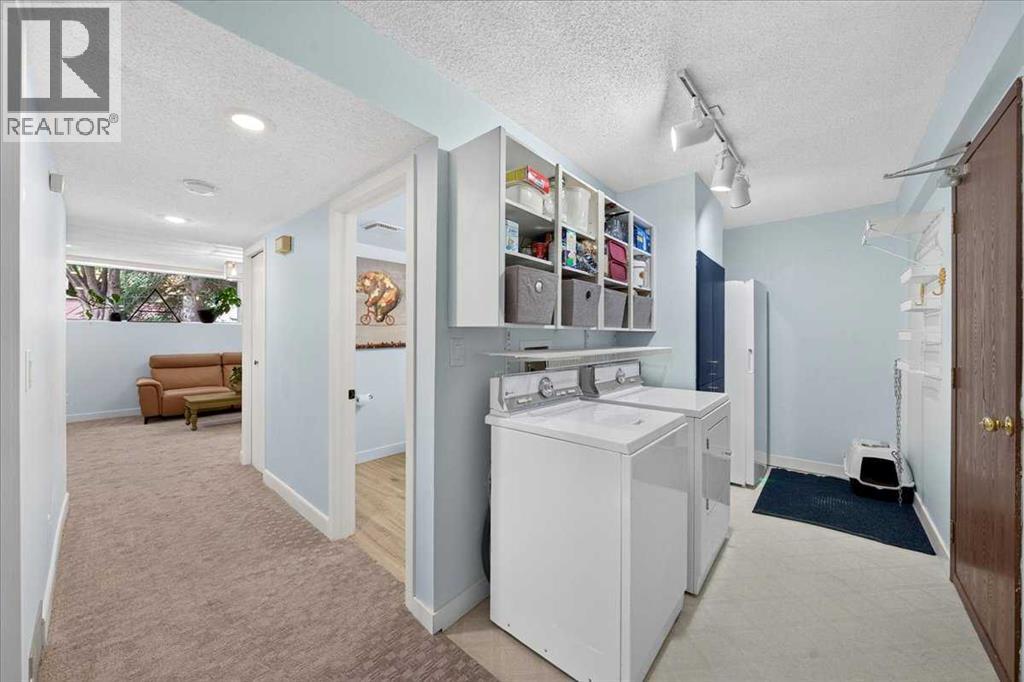 656 Ranchridge Court NW, Calgary, Alberta  T3G 1W9 - Photo 23 - A2324425