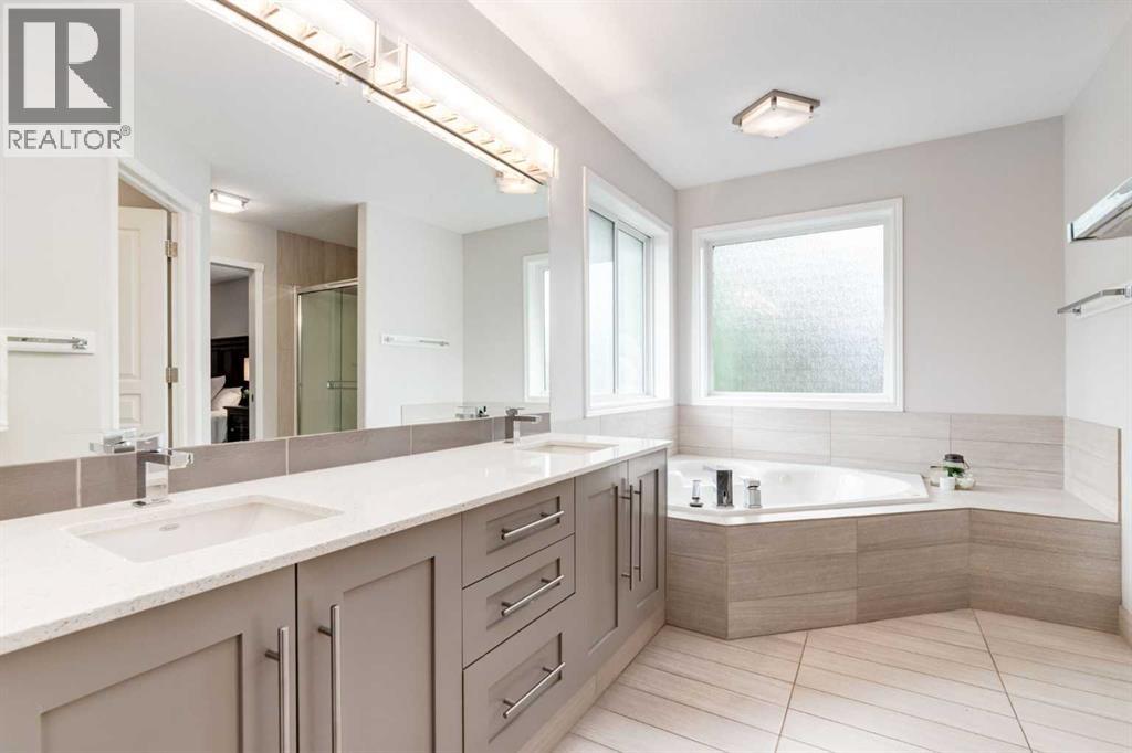 234 Strathridge Place Sw, Calgary, Alberta  T3H 4J2 - Photo 25 - A2325984